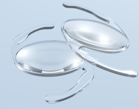 Representation of two intraocular lenses (IOL) that are implanted, one in each eye during cataract eye surgery in Iowa.